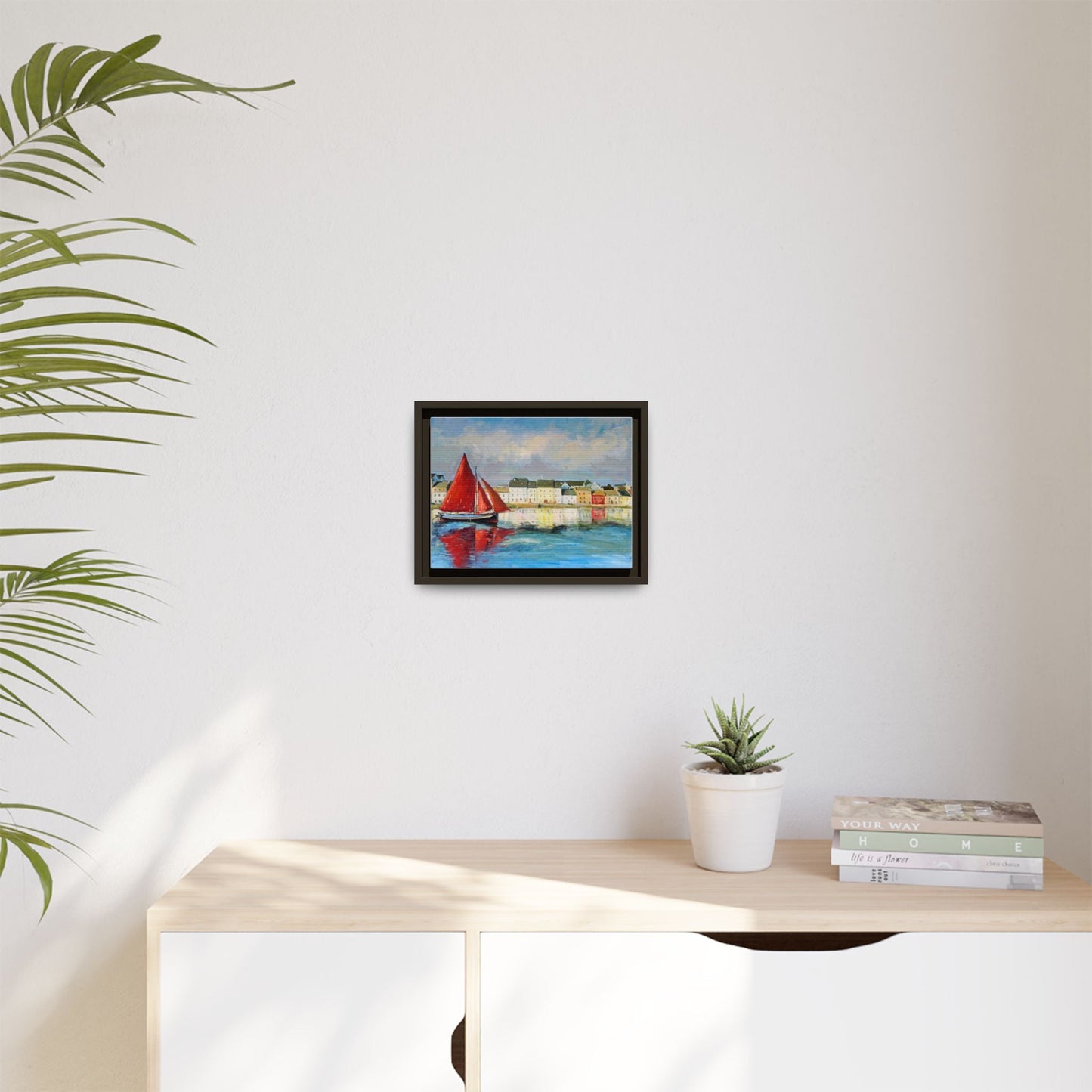 Galway Hooker Leaving Port wall art featuring a Galway Hooker boat sailing in a coastal scene, printed on high-quality canvas with a premium frame.