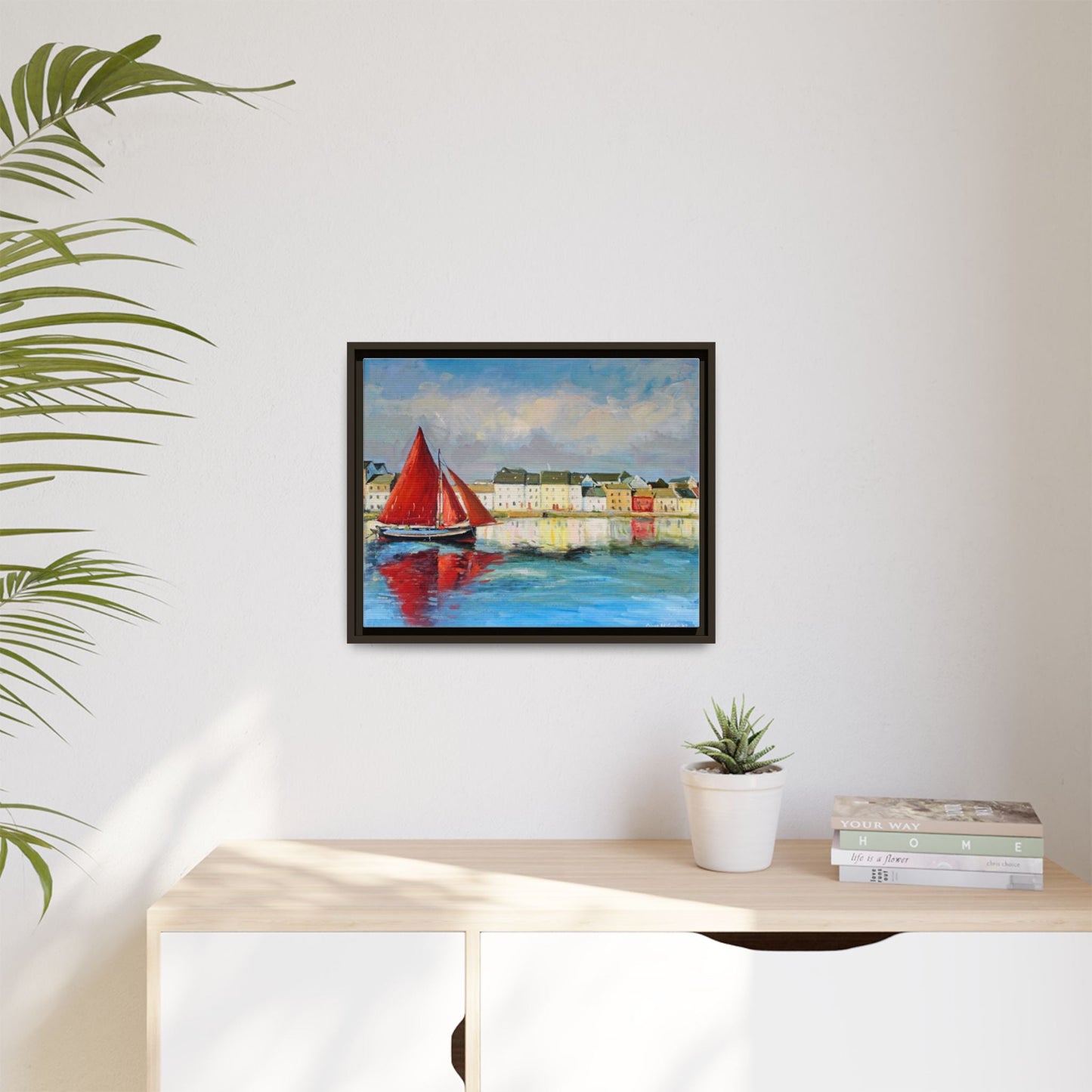 Galway Hooker Leaving Port wall art featuring a Galway Hooker boat sailing in a coastal scene, printed on high-quality canvas with a premium frame.