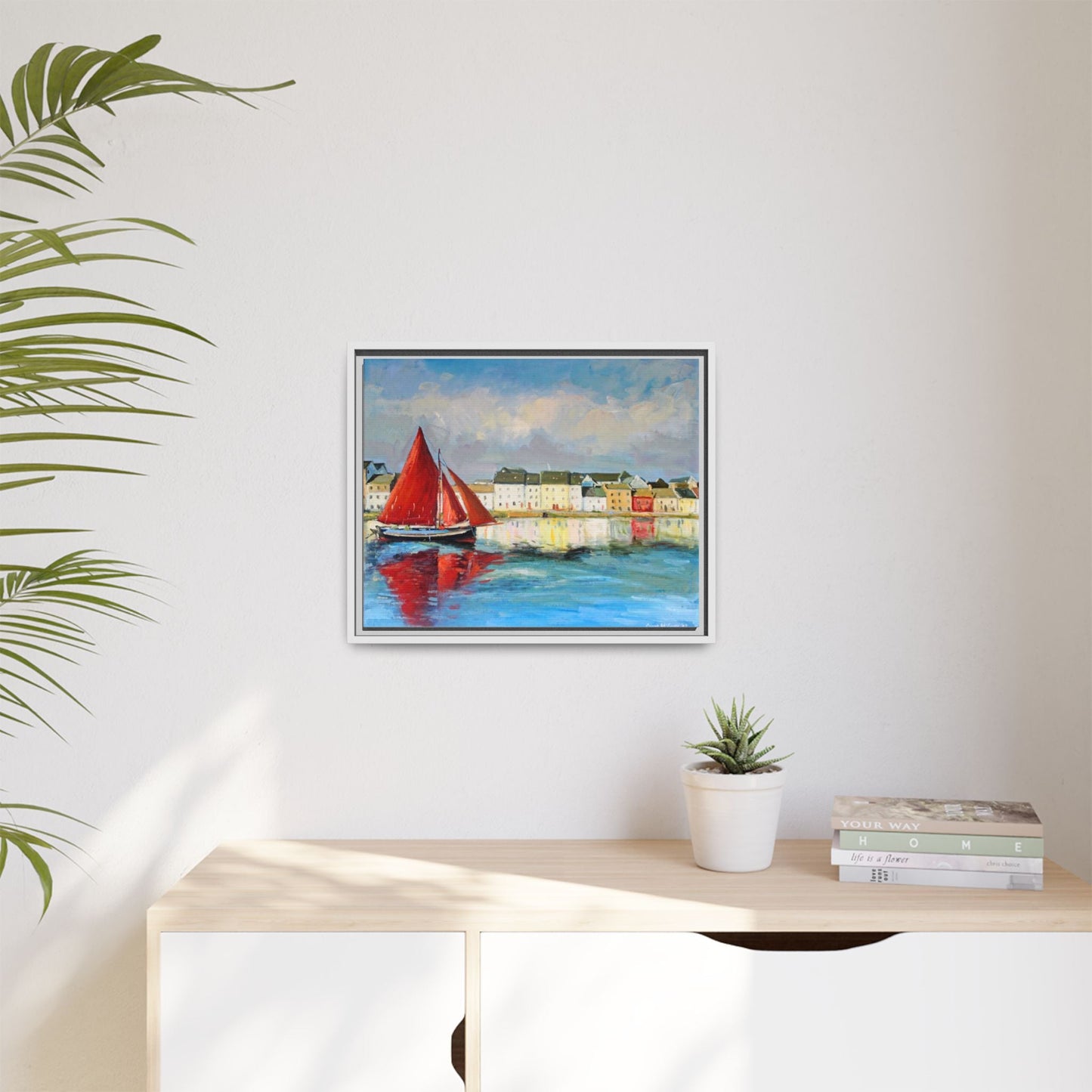 Galway Hooker Leaving Port wall art featuring a Galway Hooker boat sailing in a coastal scene, printed on high-quality canvas with a premium frame.