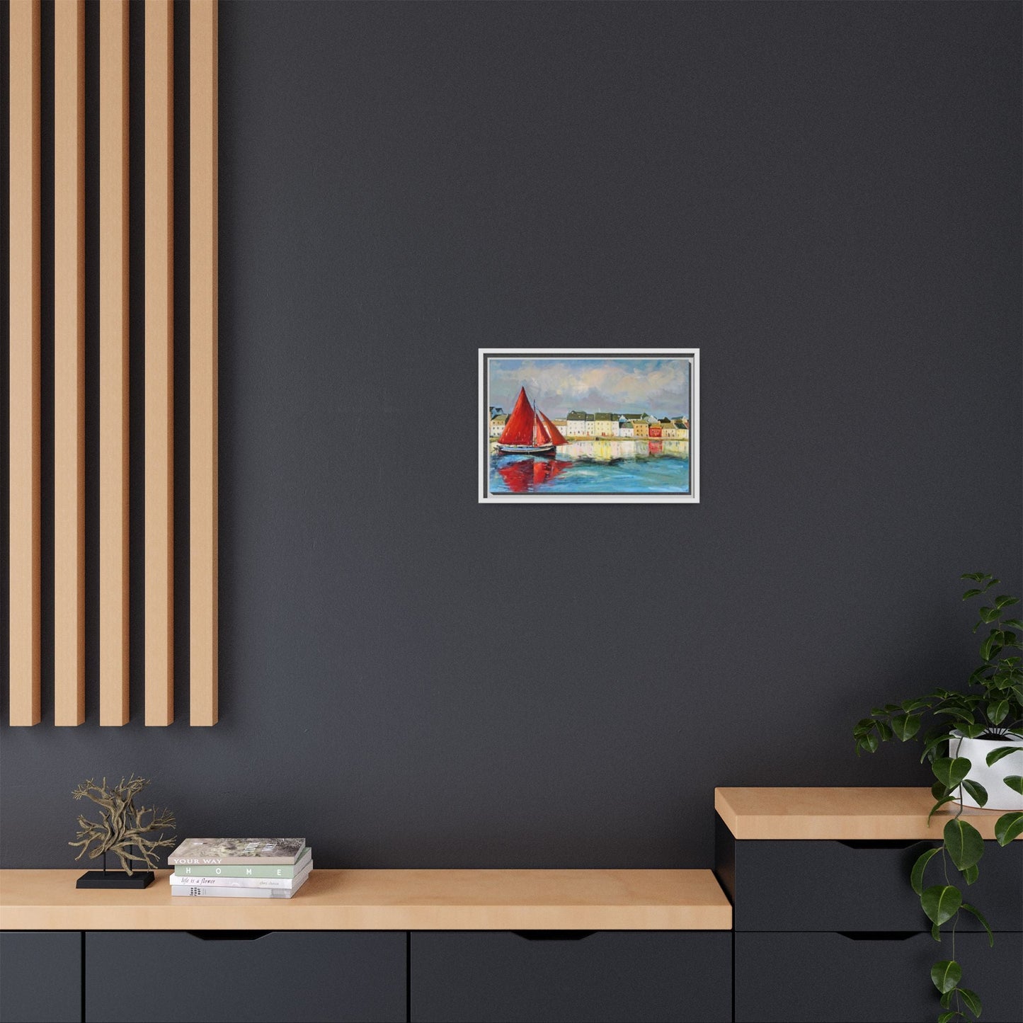 Galway Hooker Leaving Port wall art featuring a Galway Hooker boat sailing in a coastal scene, printed on high-quality canvas with a premium frame.