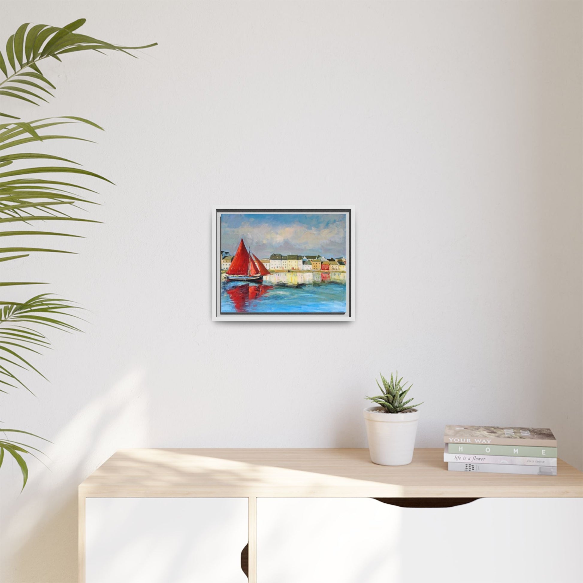 Galway Hooker Leaving Port wall art featuring a Galway Hooker boat sailing in a coastal scene, printed on high-quality canvas with a premium frame.