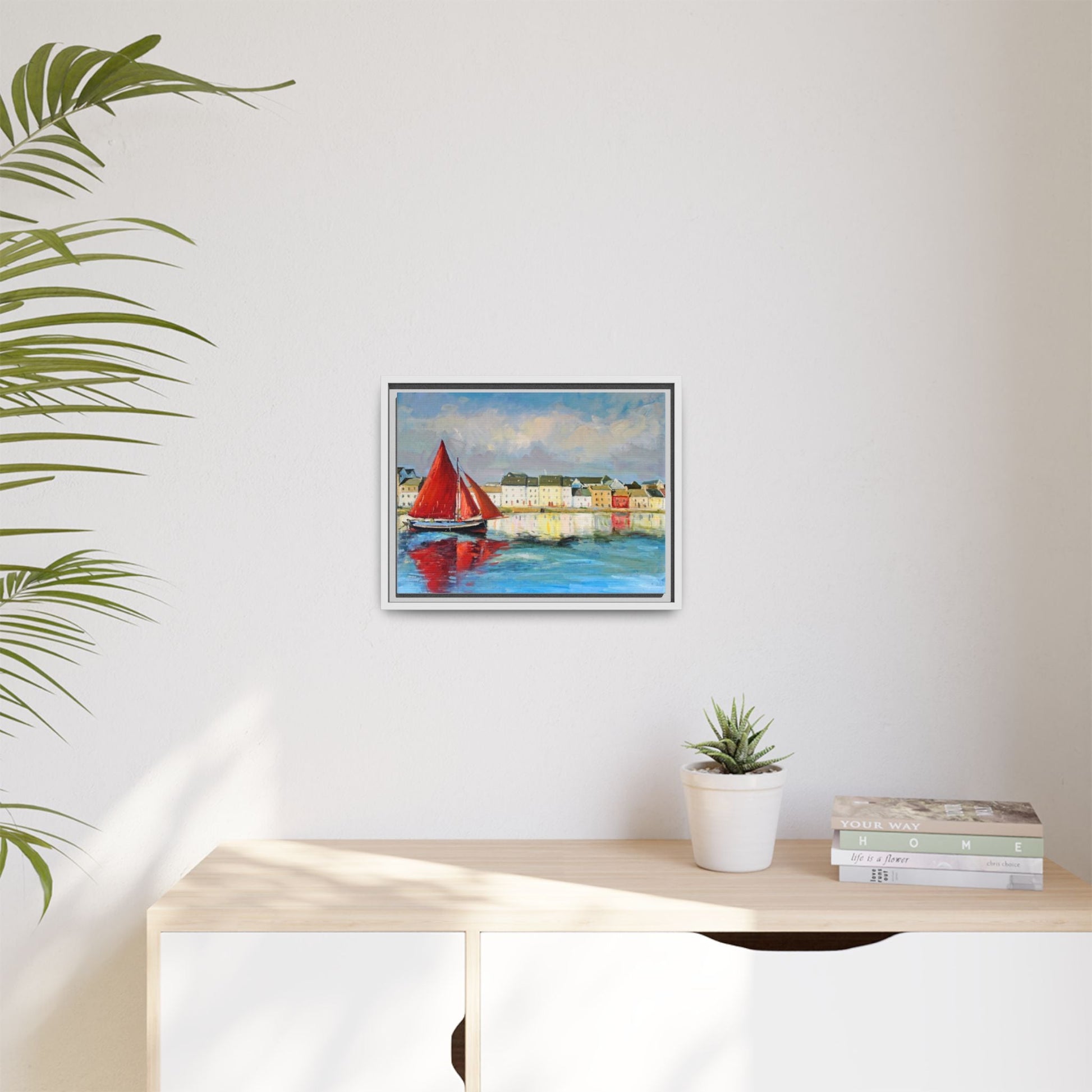 Galway Hooker Leaving Port wall art featuring a Galway Hooker boat sailing in a coastal scene, printed on high-quality canvas with a premium frame.