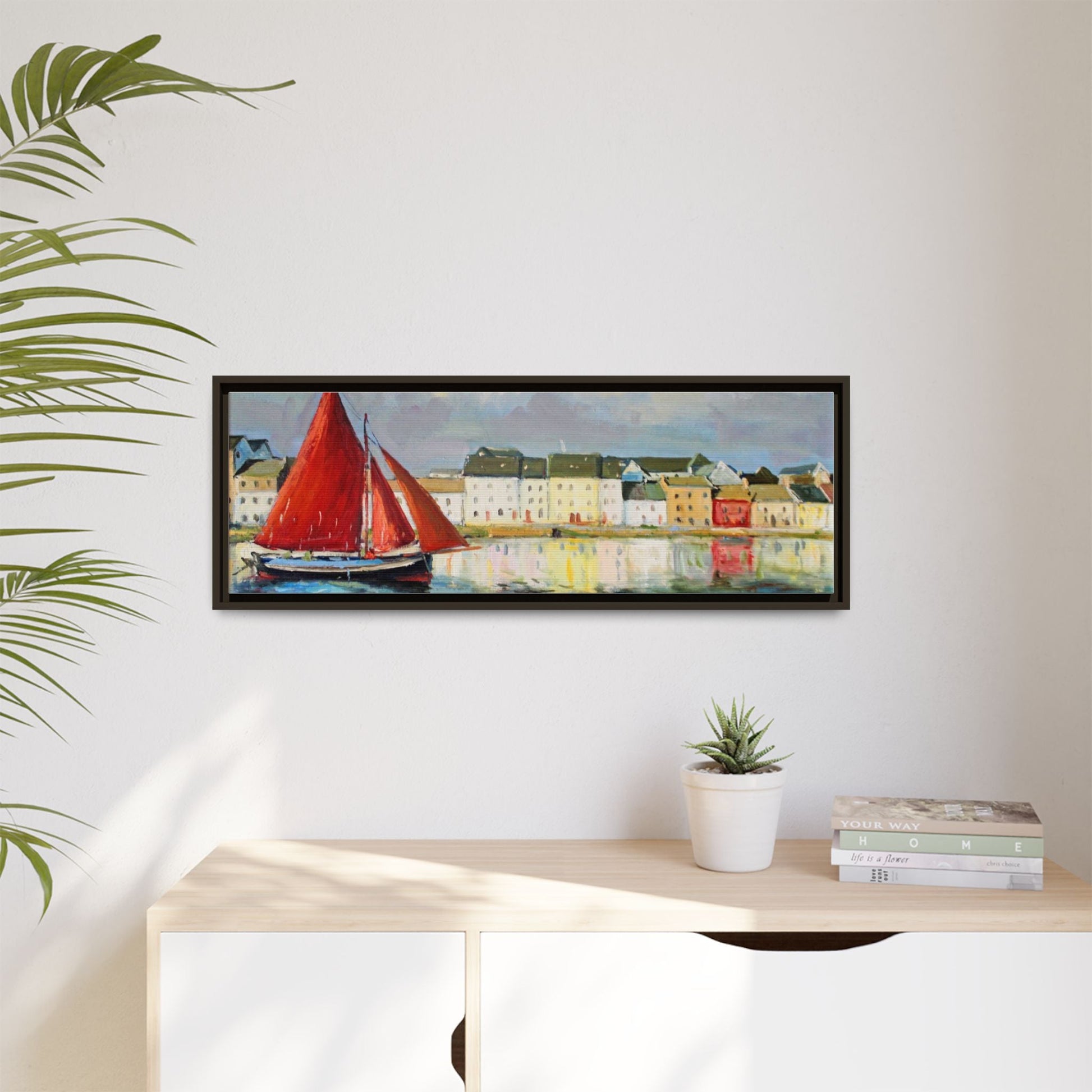 Galway Hooker Leaving Port wall art featuring a Galway Hooker boat sailing in a coastal scene, printed on high-quality canvas with a premium frame.