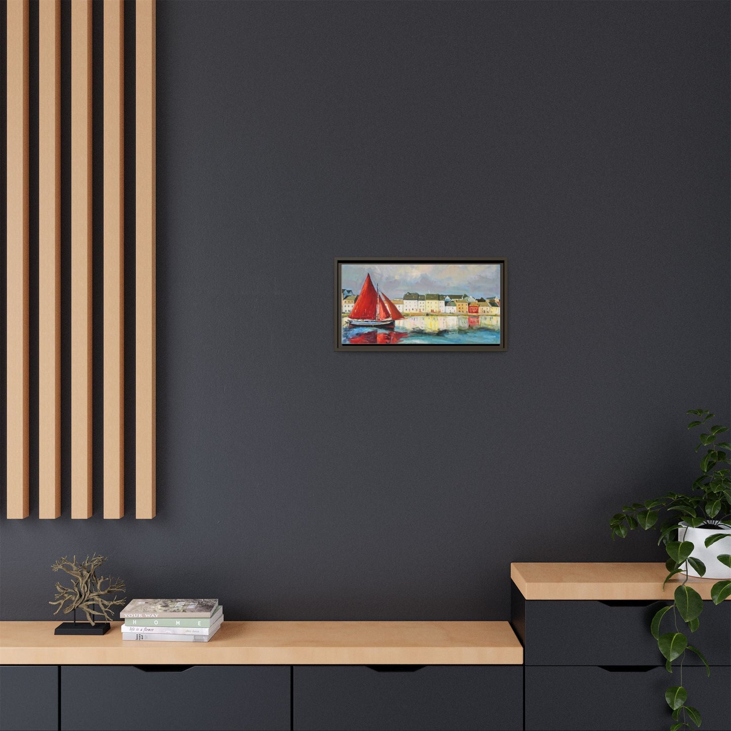 Galway Hooker Leaving Port wall art featuring a Galway Hooker boat sailing in a coastal scene, printed on high-quality canvas with a premium frame.