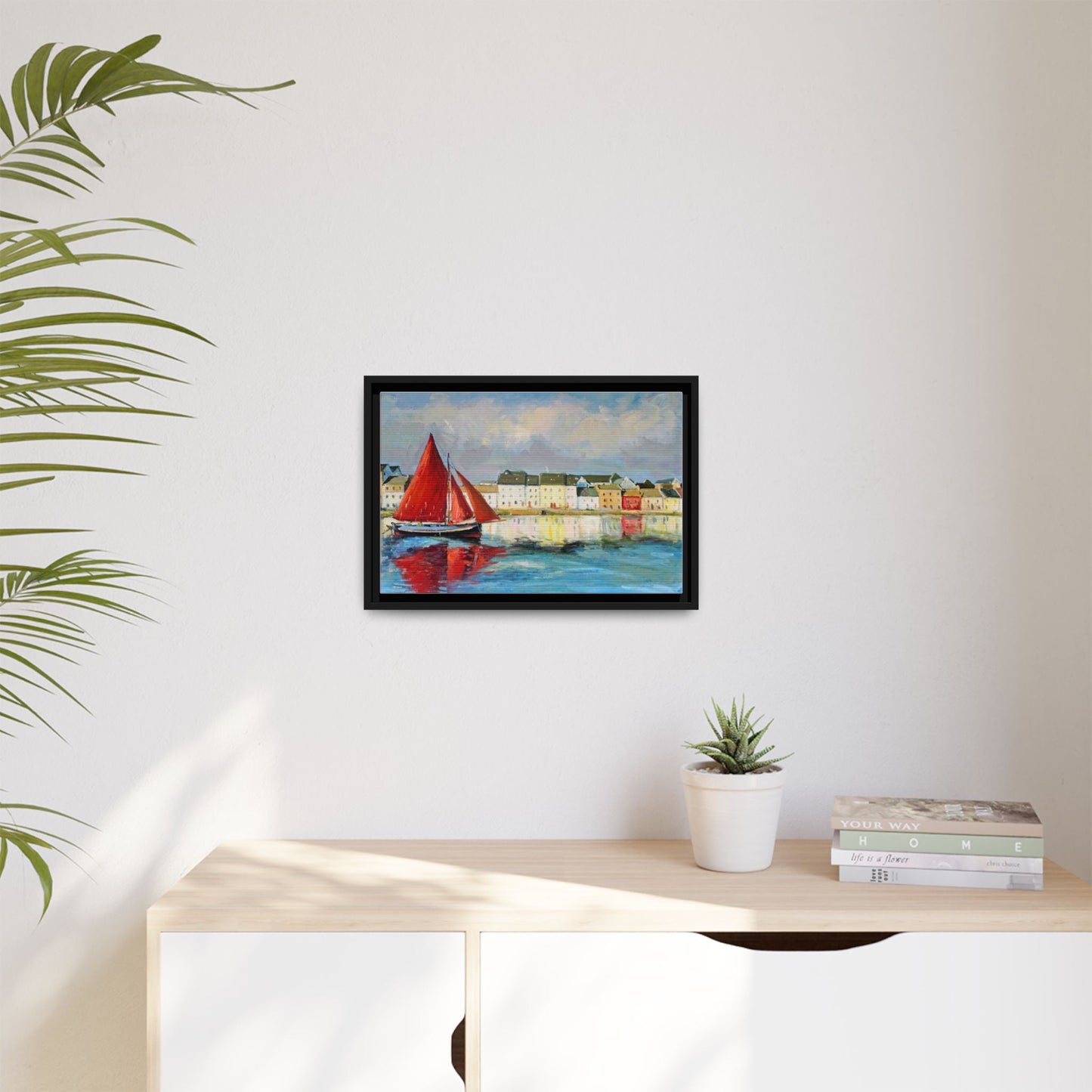 Galway Hooker Leaving Port wall art featuring a Galway Hooker boat sailing in a coastal scene, printed on high-quality canvas with a premium frame.