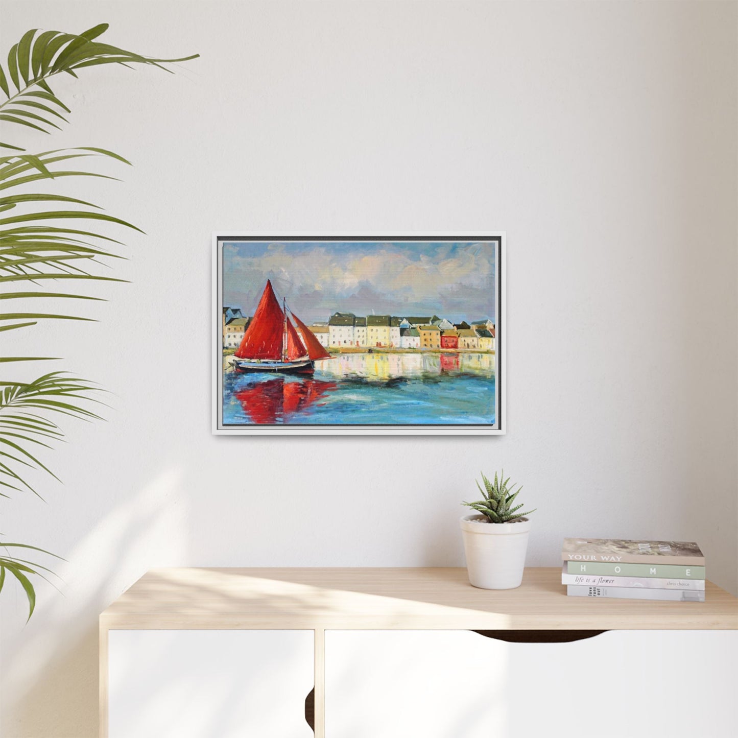 Galway Hooker Leaving Port wall art featuring a Galway Hooker boat sailing in a coastal scene, printed on high-quality canvas with a premium frame.