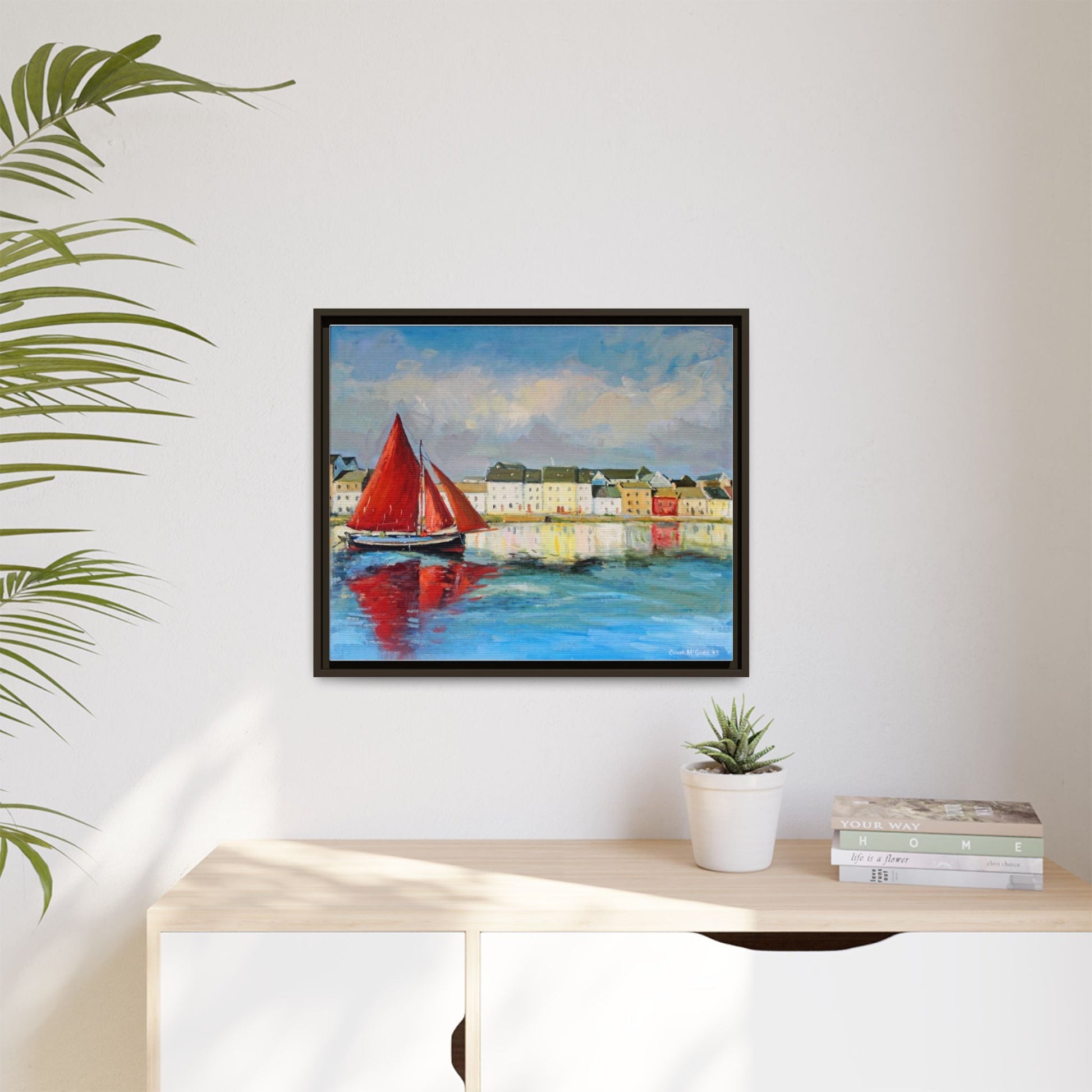 Galway Hooker Leaving Port wall art featuring a Galway Hooker boat sailing in a coastal scene, printed on high-quality canvas with a premium frame.