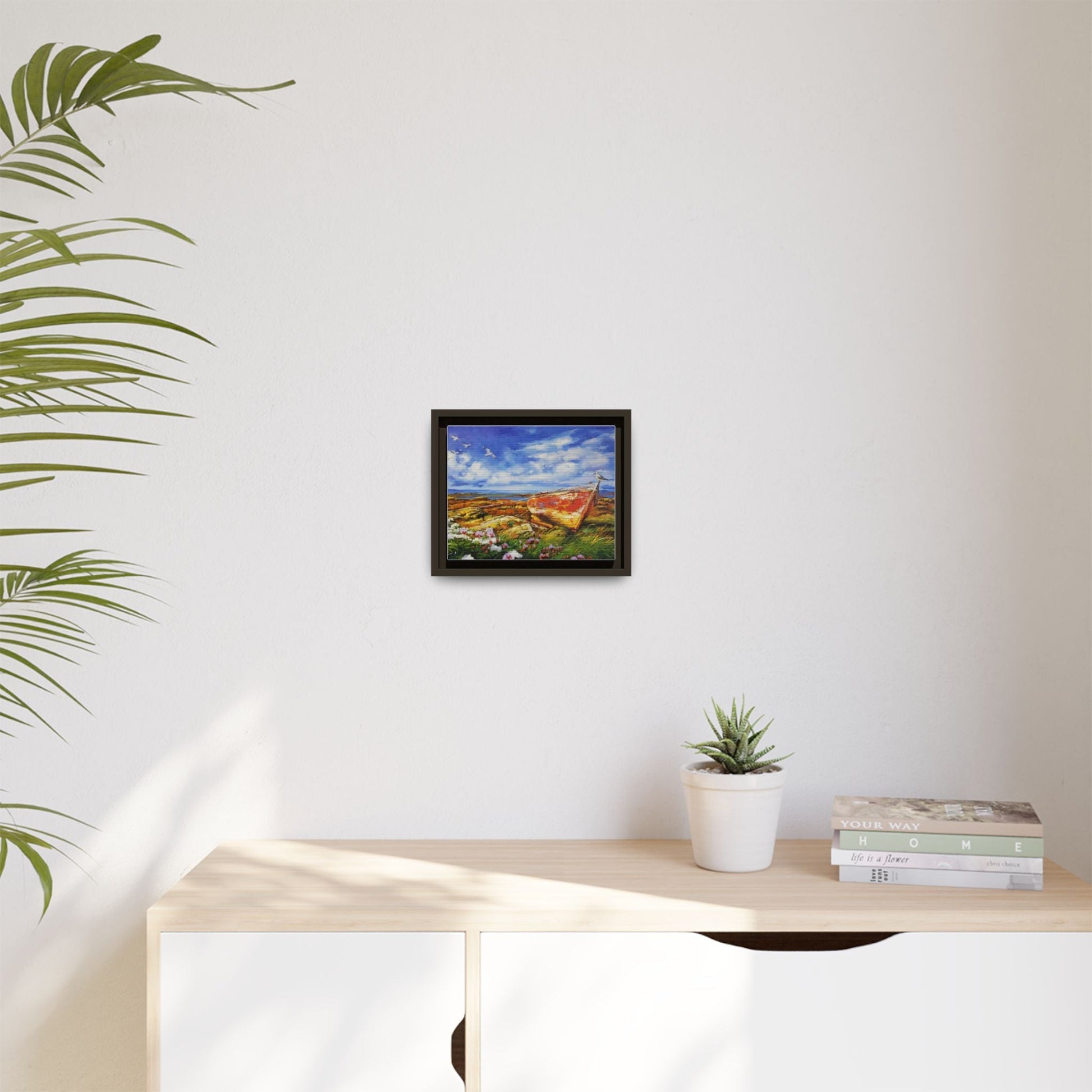 Large seagull perched on a wooden post, gazing over the ocean, framed in premium pinewood for a timeless and elegant décor piece.