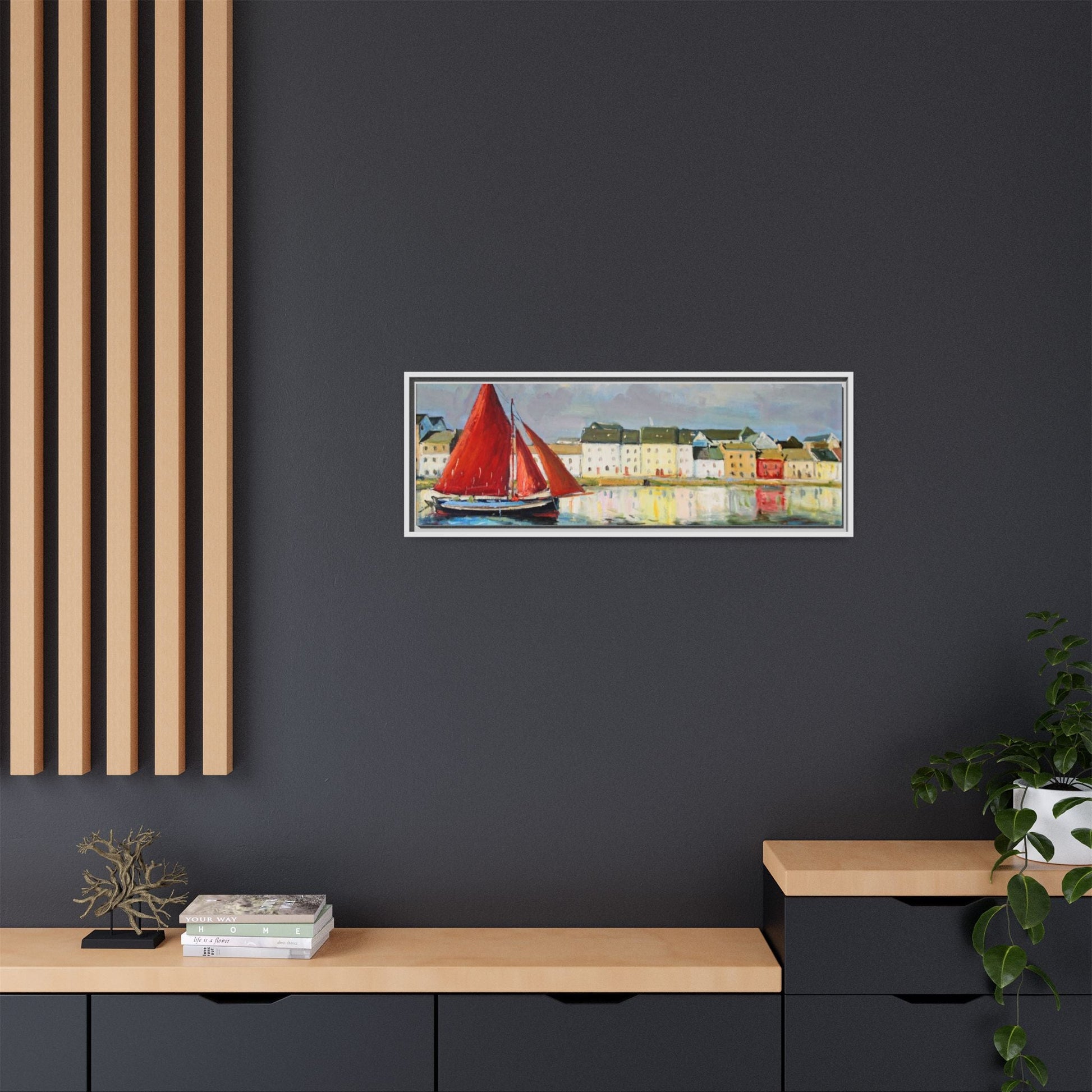 Galway Hooker Leaving Port wall art featuring a Galway Hooker boat sailing in a coastal scene, printed on high-quality canvas with a premium frame.